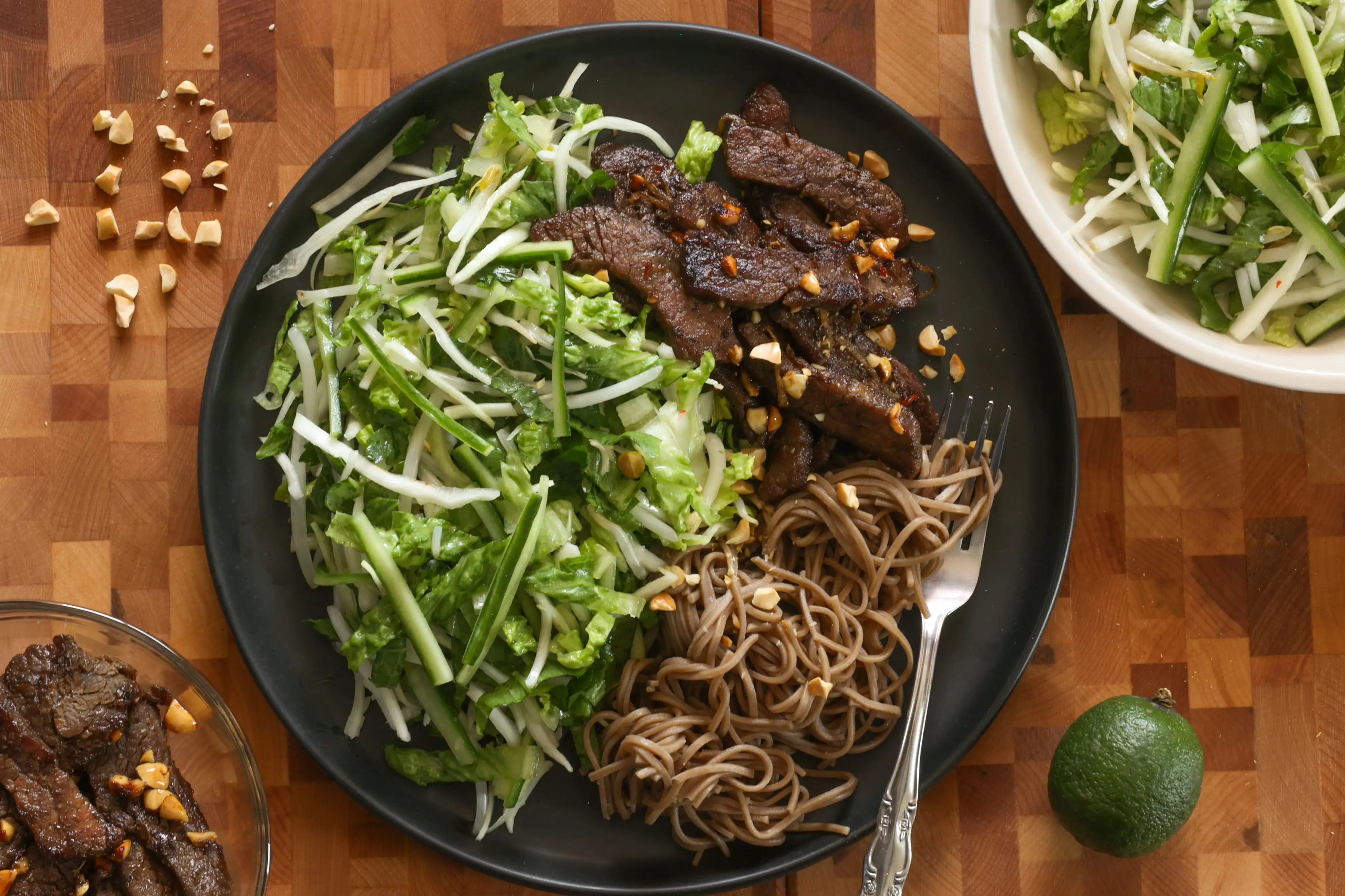 Sticky ginger beef spring roll salad