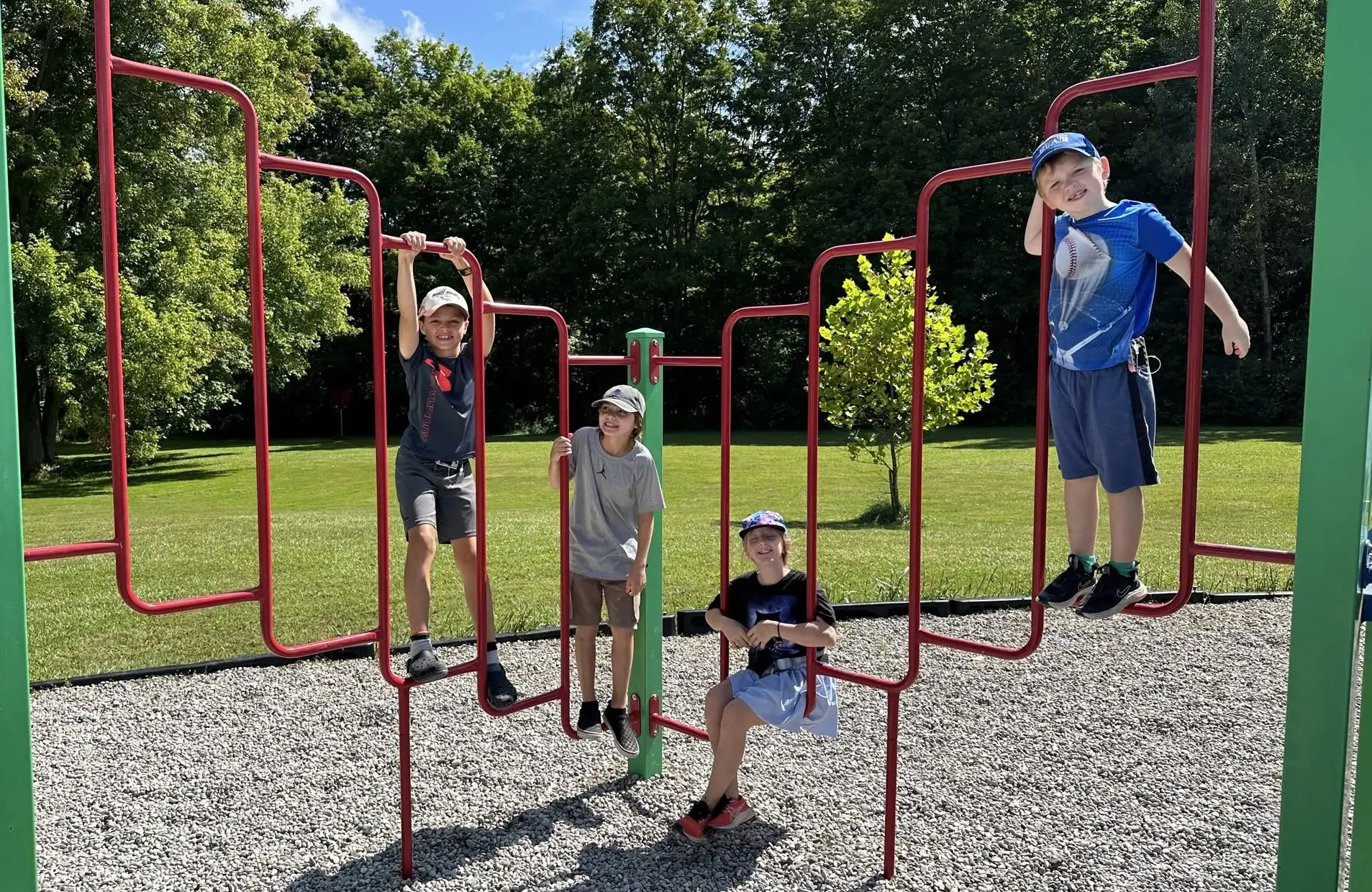 a group of kids playing on a playground